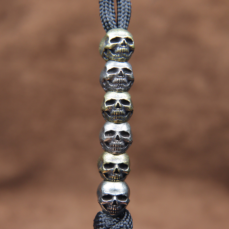 Mini Schedel Hoofd Messing Mes - Paracord Survival Bracelet recensie en prijs