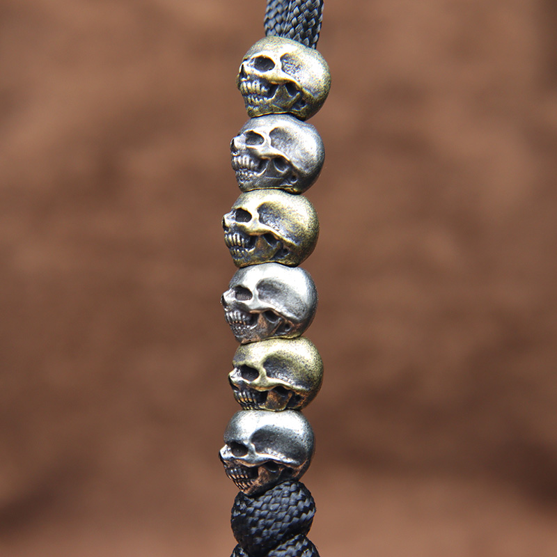 Mini Schedel Hoofd Messing Mes - Paracord Survival Bracelet recensie en prijs