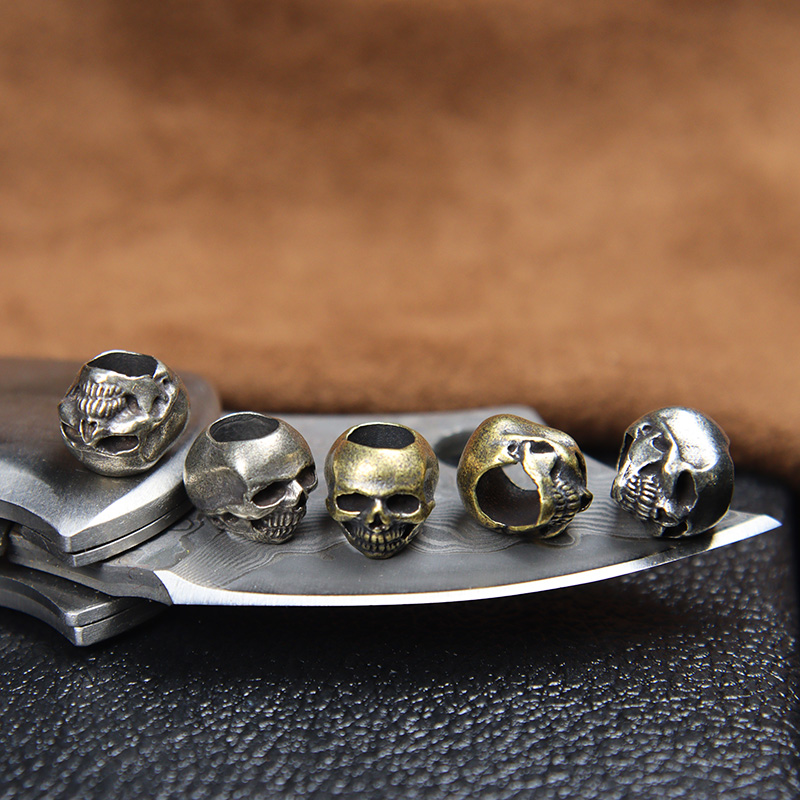 Mini Schedel Hoofd Messing Mes - Paracord Survival Bracelet recensie en prijs